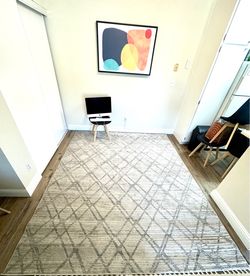 Beige Area Rug with Geometric Diamond Pattern