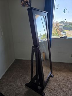 Mirror with storage