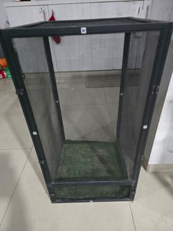Reptile cage with water mister and waterfall