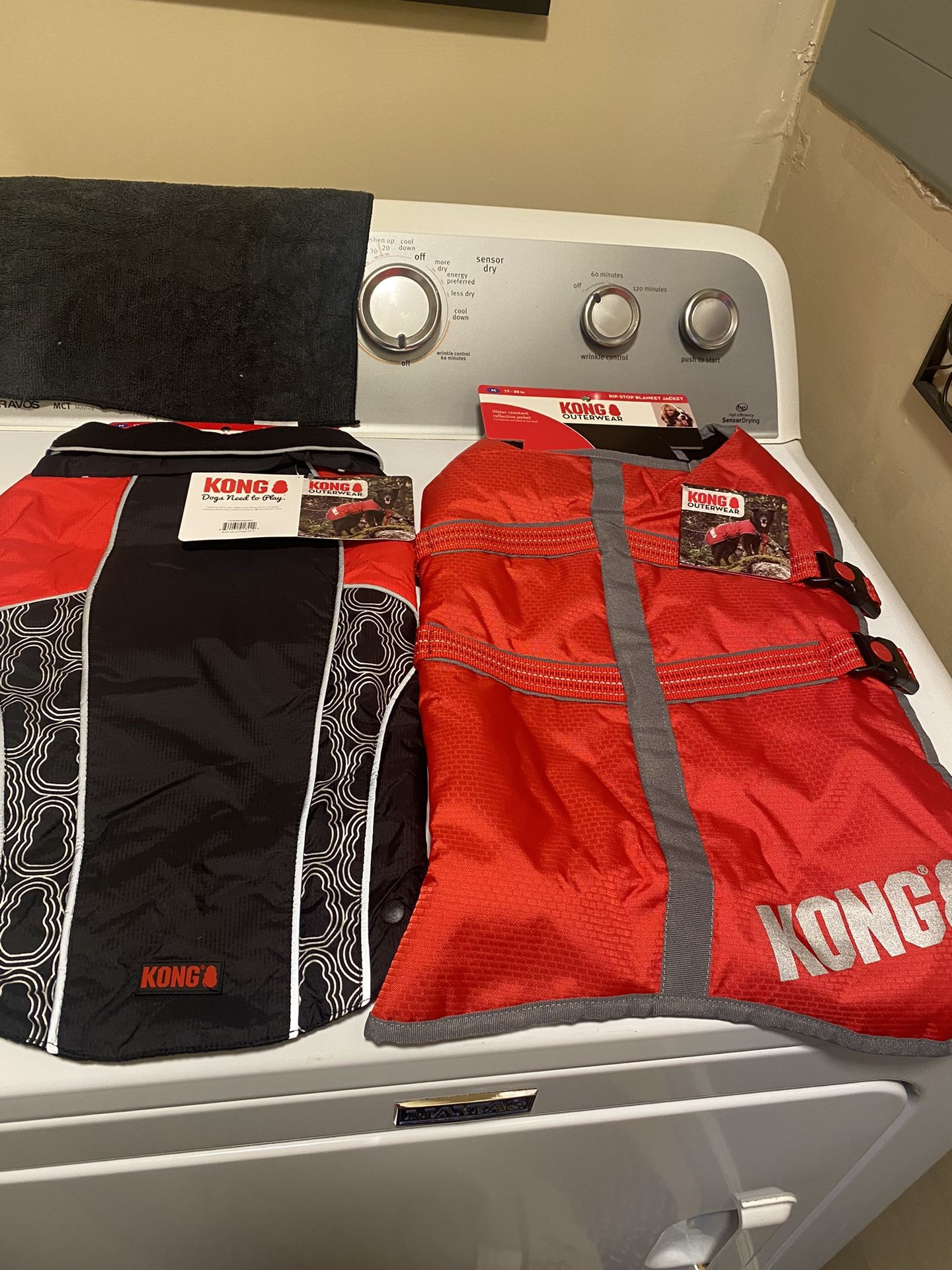 Medium size, Kong  dog coach, waterproof with lining $20 each