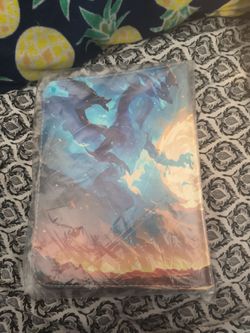 $15 NEW FIRE AND DRAGON. HOLDS 200 CARDS