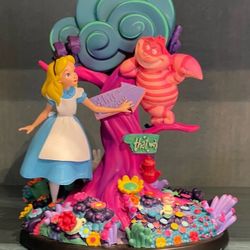 Disney parks Alice in wonderland glow in the dark Figure 