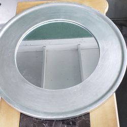 Silver round mirror
