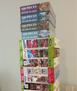 10 Brand New Puzzles - never opened