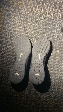 Size 9, blue and black cleats, Nike