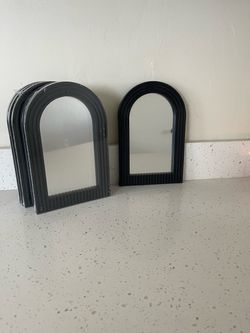 Black Arched Wall Mirrors with Ribbed Frame