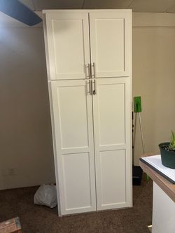 Tall White Storage Cabinet with Doors
