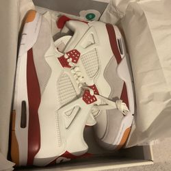 Jordan 4s SB Varsity Red