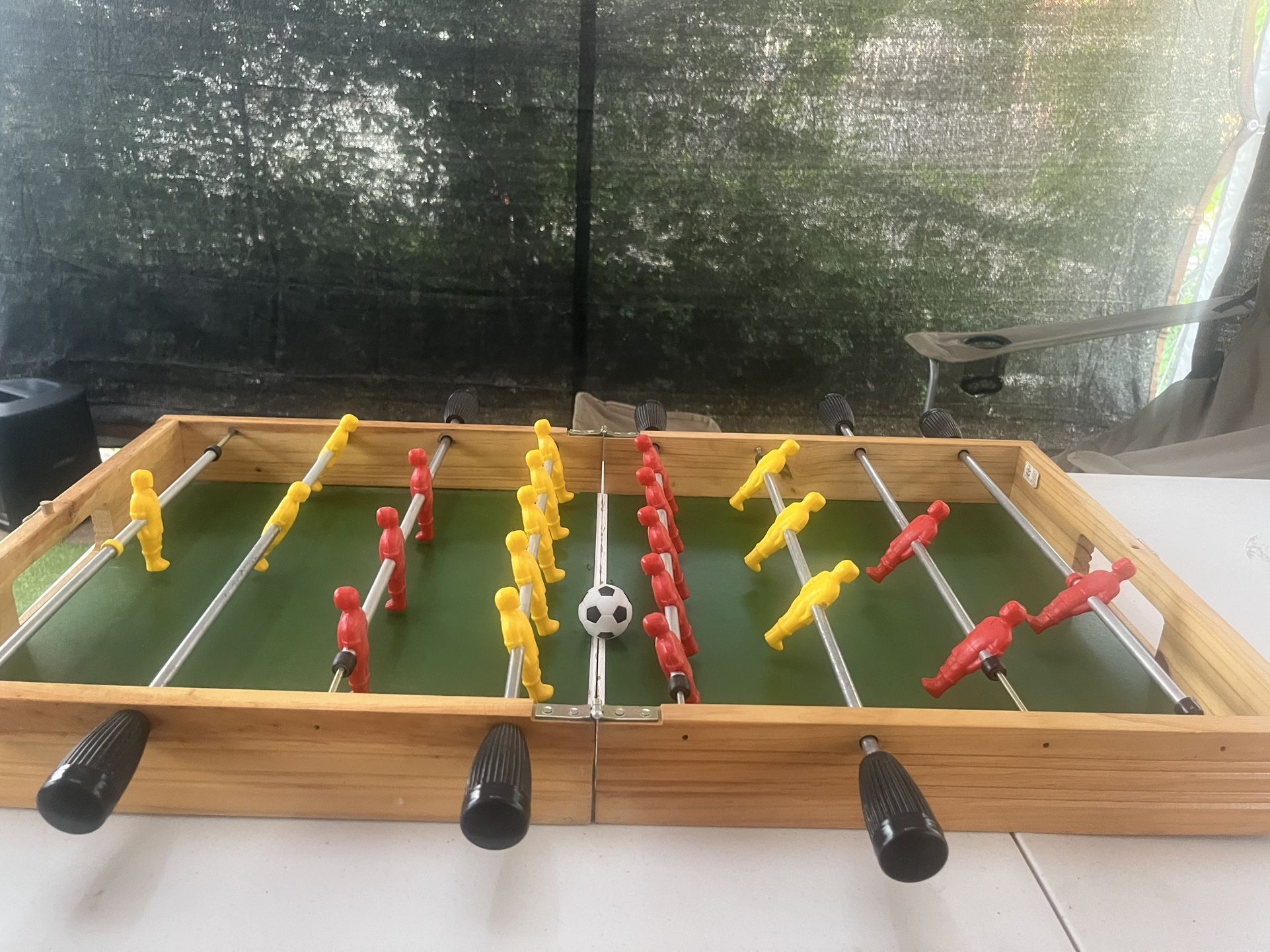 Vintage foldable foosball table for kids and adults.
