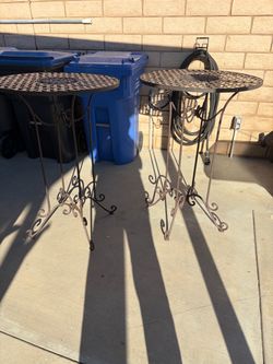 2- wrought iron tables