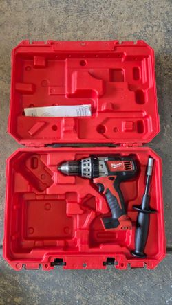 Used Milwaukee 2606-20 M18 Lithium-Ion Cordless 1/2 in. Drill Driver  only come with case and side handle assembly only. NO battery or charger.