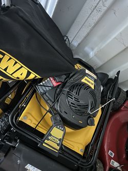 Brand New Gas Self Propelled Dewalt Lawnmower with Warranty.