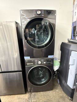 New open box LG Stainless steel front load washer and gas dryer set