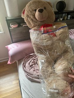 Giant Stuffed Teddy Bear with Red Bow