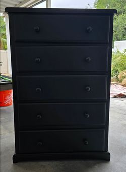 Nice solid wood dresser.