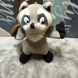 Disney Pocahontas Meeko Raccoon plush toy.