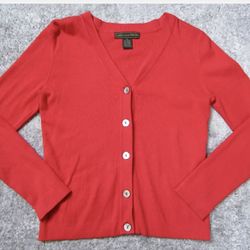 Linda Matthew’s Red Cardigan 