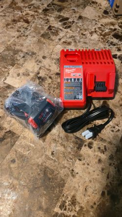 New Milwaukee 5.0 Battery & Charger