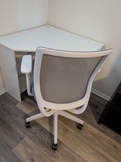 Corner desk with chair