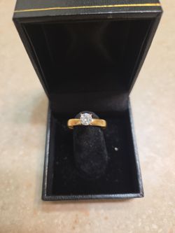 10 k gold ring.  Weight is 1.7 grams