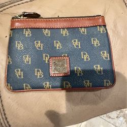 Dooney & Bourke Slim Wristlet With Attached Key Ring. Pre-owned VG Condition.