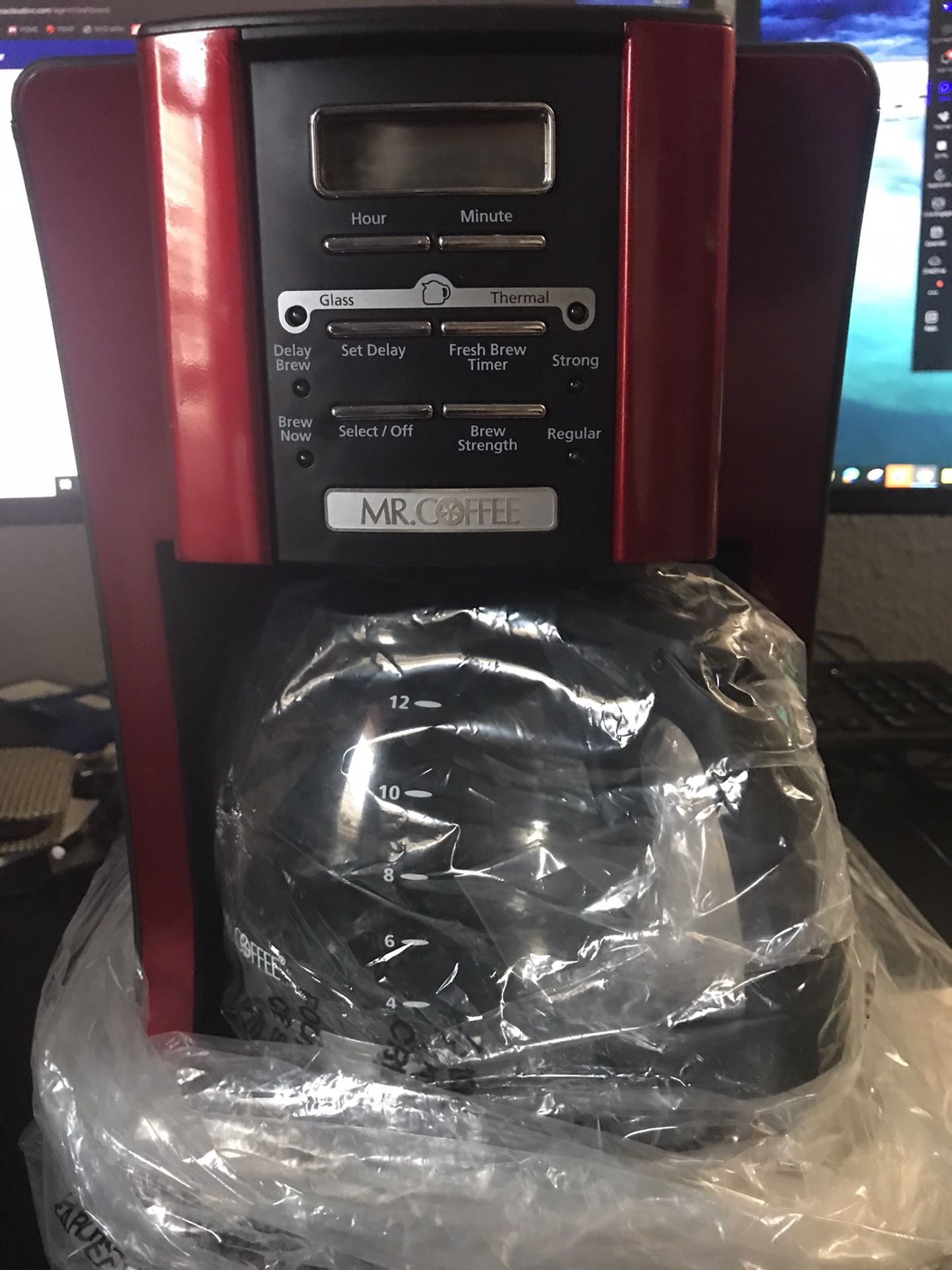 Mr. Coffee 12 cup programmable coffee maker in metallic red and black. $20.00