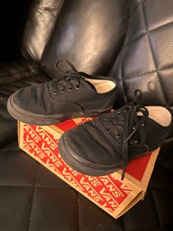 Black vans with shoe lace