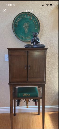 Ethan Allen bar cabinet with custom mirrored interior