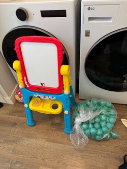 Easel, ball pit balls and Diaper Bag