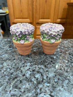 Pfaltzgraff Lavender Terra Cotta Pair of Salt and Pepper Shakers .  Size approximately 2 3/4 inches tall.  Preowned.