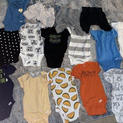 40$ Boy clothing 3-6,6-9 onesies . Never worn but washed
