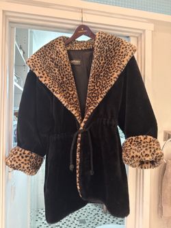Leopard and black coat