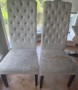 Pair of tufted high-back dining chairs