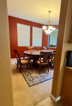Formal dinning table and 8 chairs