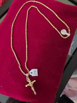 10k gold 22-inch Milano chain and Christ pendant
