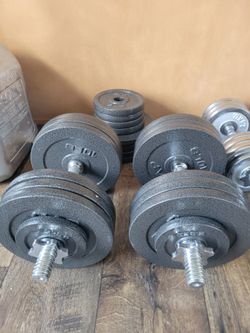 $170.   200 LBS  ADUSTABLE DUMMBELLS