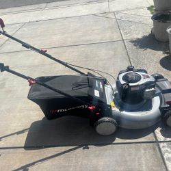 Murray 22 in. 140 cc Briggs & Stratton Walk Behind Gas Self-Propelled Lawn Mower with Front Wheel Drive and Bagger.