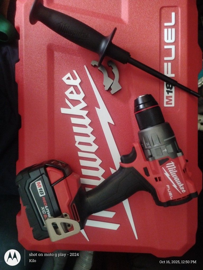 Brand New MILWAUKEE HAMMER DRILL AND 5.0 batt.