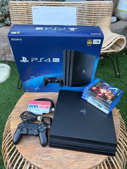 PS4 Pro In Box Bundle Minty with Games Tested