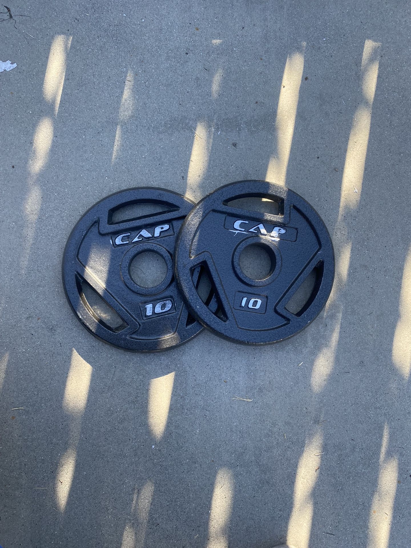 (2) 10LB OLYMPIC WEIGHT PLATES 