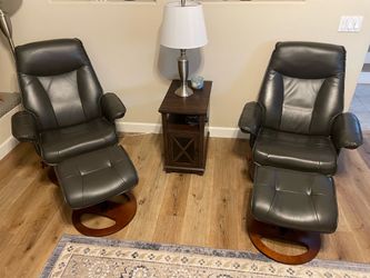 Charcoal Gray Swivel Reclining Chairs with matching foot stools