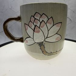 Beautiful Large Hand made & hand Painted Glazed stoneware mug with tulip and stem going around and into the cup. One of a kind. Great quality and cond