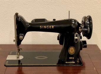 Antique Singer Sewing Machine in Cabinet