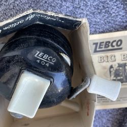 Antique Zebco Push Button Reel