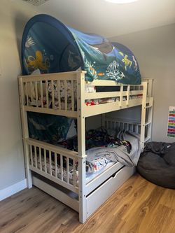 White twin bunk beds with trundle