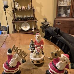 Music box Ceramic . santa and two other ceramic santas