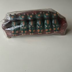 Frogs Wooden Frogs On Wooden Couch