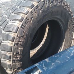 295/70/18 COOPER STT PRO TIRES (2)