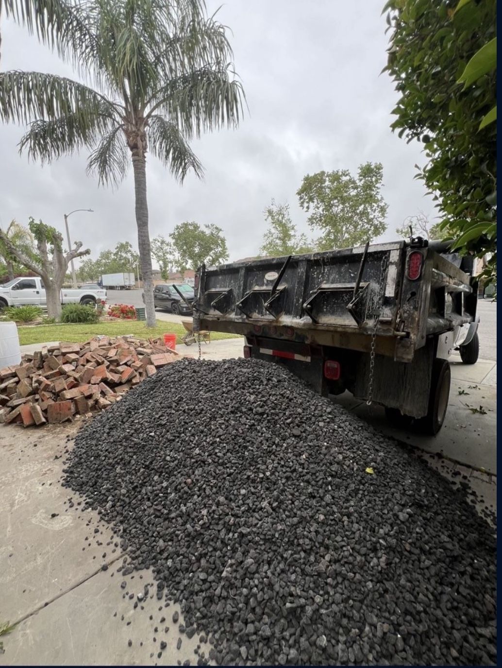 mini bobcat/dump trailer