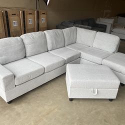 FREE DELIVERY AND INSTALLATION - Brand New in box gray Sectional and Ottoman (Look my profile)